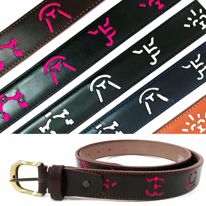 Spanish leather bullfighting belt with embroidered cattle ranch brands and brass buckle.