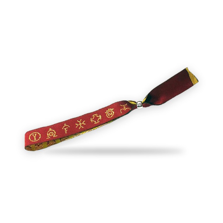 Pulsera taurina de tela con hierros ganaderos dorados – vista 4