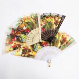 Lace-trimmed Spanish fan with flamenco and bullfight scenes