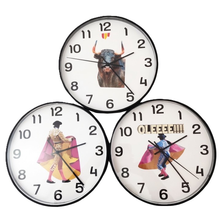Set of three Spanish bullfighting-themed wall clocks, traditional Spain souvenir with matadors, bull and capote.