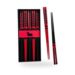 Pauzinhos chineses do touro de Osborne com fundo vermelho, cinco pares