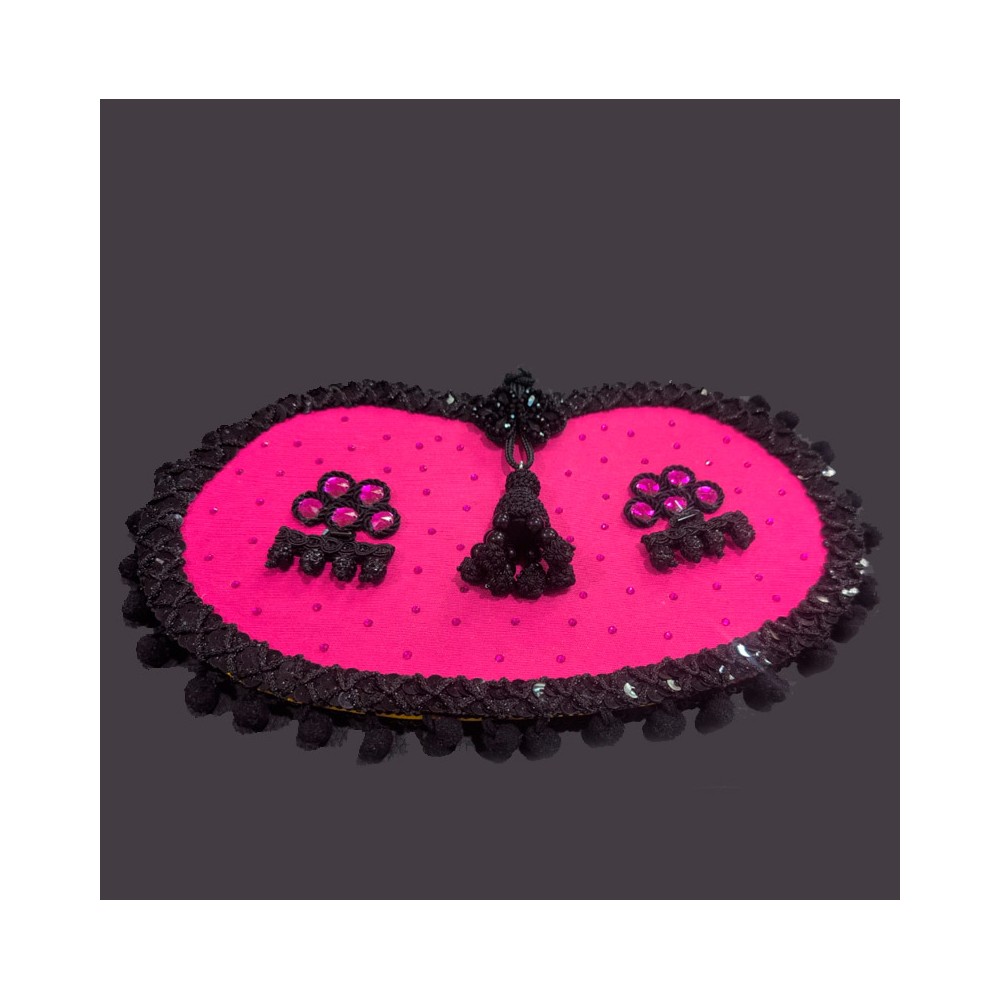 Cartera de mano "Fucsia capote, alamares y machos"