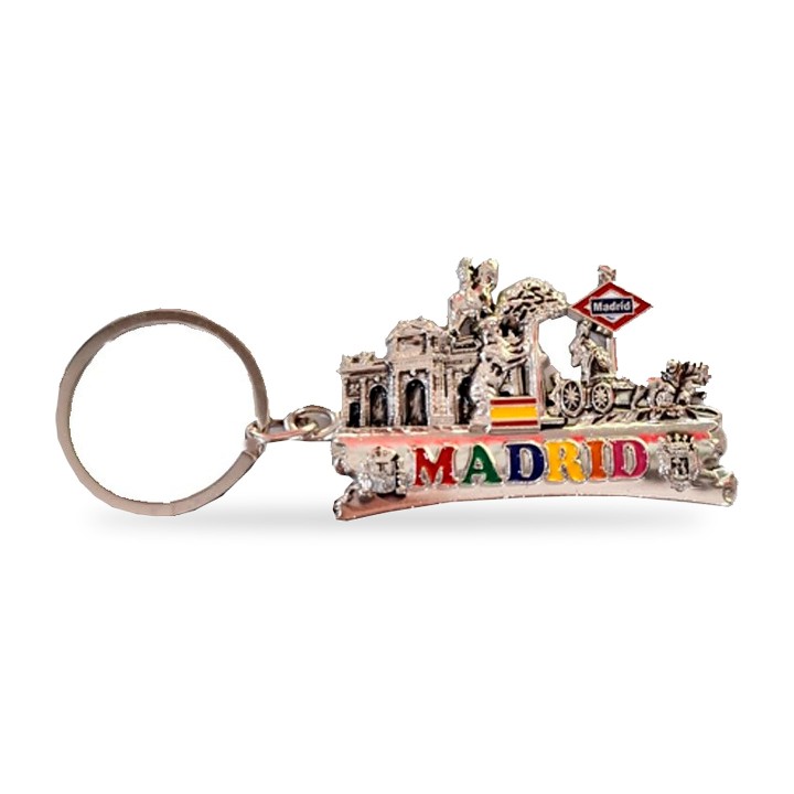 Llavero de metal con monumentos de Madrid en relieve, logo del Metro y bandera