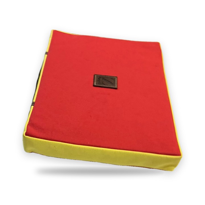 Red Muleta bullring cushion with yellow sides