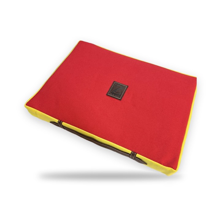 Red Muleta bullring cushion with yellow sides