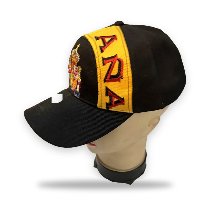 Black Spain cap with embroidered crest and yellow lettering