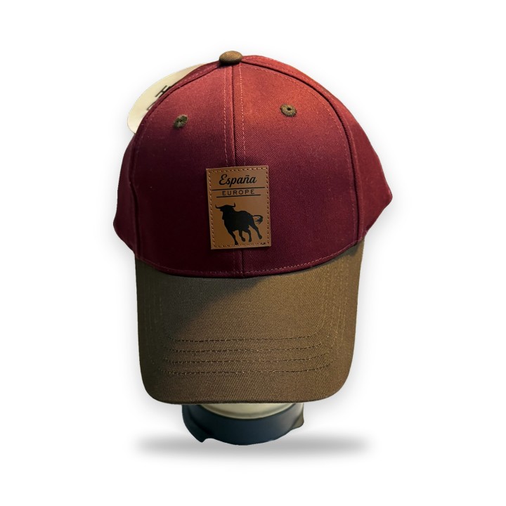 Gorra Robin Ruth granate con visera marrón y parche de piel con toro
