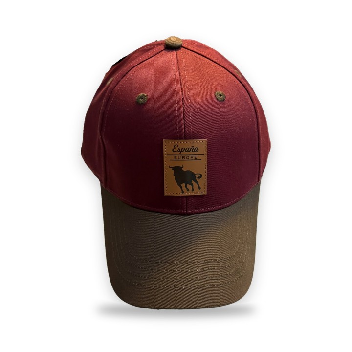 Casquette Robin Ruth grenat, visière marron et écusson en cuir avec taureau