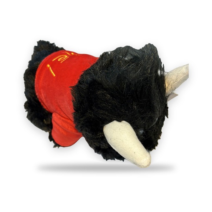 Touro de peluche preto com capote vermelho e a palavra «Olé»