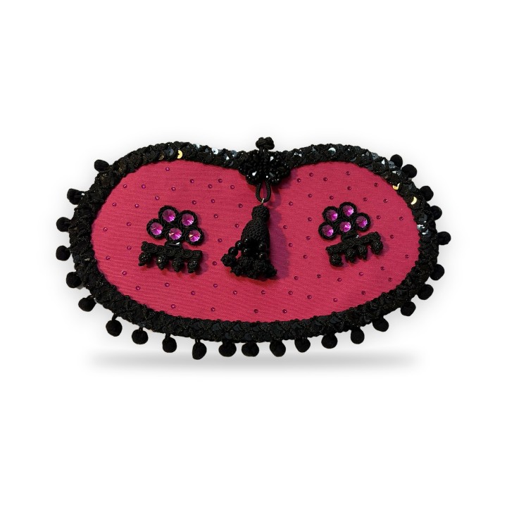 Pochette fucsia con pompon neri