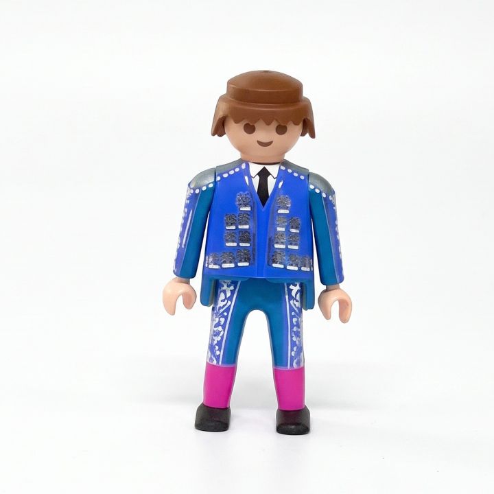Click Playmobil torero con traje de luces azul y pelo castaño
