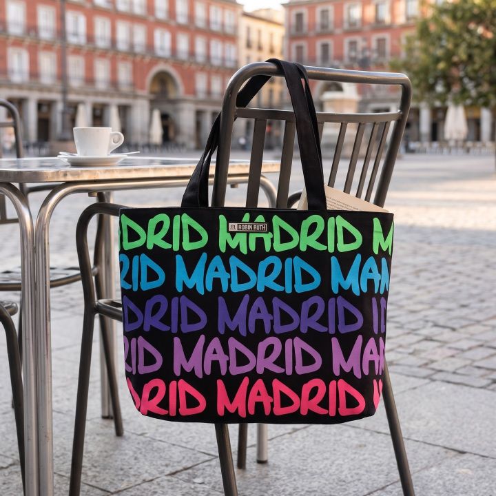 Robin Ruth colourful Madrid tote bag on a café terrace in a Madrid square