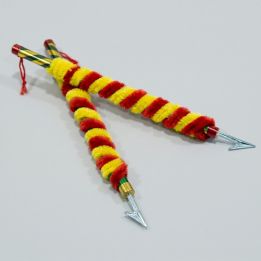 Pair of children's bullfighter costume banderillas, red and yellow with plastic tip