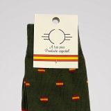 Close-up of the label and pattern of the green Spanish flag socks
