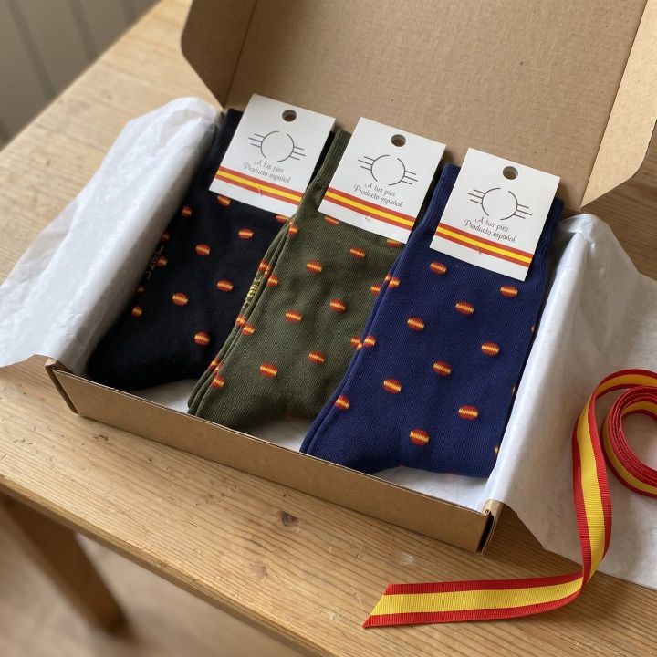 Three pairs of Spanish flag socks in a gift box