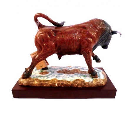 Bull charging porcelain with base